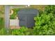 Overhead shot of home featuring a new roof, private driveway, and mature trees at 1816 Lisbon Ln, Charlotte, NC 28269