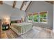 Bright bedroom with large windows, vaulted ceiling, and natural light at 1816 Lisbon Ln, Charlotte, NC 28269