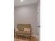 Cozy entryway nook with hardwood floors, vintage bench, and white walls at 1816 Lisbon Ln, Charlotte, NC 28269