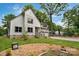 Charming two-story home with modern black trim, front yard, and walkway to entrance at 1816 Lisbon Ln, Charlotte, NC 28269