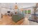 Open kitchen with large island, pendant lighting, and access to the living and dining areas at 1816 Lisbon Ln, Charlotte, NC 28269