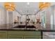 Modern kitchen with dark marbled countertops and stainless steel appliances in an open floor plan at 1816 Lisbon Ln, Charlotte, NC 28269