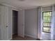 Bedroom with ample natural light showcasing the closet and a comfortable layout at 1820 Trinity Church Rd, Monroe, NC 28112
