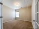 Versatile room with neutral walls and plush carpeting, perfect for a home office or study at 1876 Yellow Daisy Dr, Matthews, NC 28104