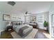 Comfortable bedroom with neutral tones, ample natural light, and hardwood floors at 1909 Summey Ave, Charlotte, NC 28205