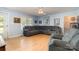 Spacious living room with a sectional sofa, bright walls, and natural light streaming through the window at 195 Kings Ter, Salisbury, NC 28146