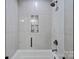 Contemporary bathroom showcasing sleek glass shower, neutral tile, and modern hardware, for a spa-like experience at 19501 River Falls Dr, Davidson, NC 28036
