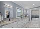 Elegant bathroom with double vanity, marble countertop, custom mirrors, and modern fixtures at 19501 River Falls Dr, Davidson, NC 28036