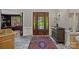 Elegant foyer features marble flooring, detailed woodwork, and a glimpse of the outdoor scenery at 19501 River Falls Dr, Davidson, NC 28036