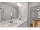 Bright bathroom with double vanity and a large mirror at 2025 Groves Edge Ln, Waxhaw, NC 28173