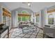 Comfortable living room with vaulted ceilings, and large windows that offer beautiful natural light at 2025 Groves Edge Ln, Waxhaw, NC 28173