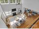 Bright living room showcases a fireplace, ample seating, and seamless access to the kitchen at 2025 Groves Edge Ln, Waxhaw, NC 28173