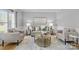 Cozy living room featuring neutral tones, stylish furniture, and ample natural light at 2025 Groves Edge Ln, Waxhaw, NC 28173