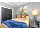 Cozy bedroom with neutral tones, bright window, and comfortable furnishings at 219 Reese Wilson Rd, Belmont, NC 28012