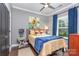 Cozy bedroom with neutral tones, bright window, and comfortable furnishings at 219 Reese Wilson Rd, Belmont, NC 28012