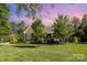 Charming home featuring a lush green lawn and well-maintained landscaping and traditional American architecture at 219 Reese Wilson Rd, Belmont, NC 28012