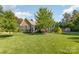 Charming home featuring a lush green lawn and well-maintained landscaping and traditional American architecture at 219 Reese Wilson Rd, Belmont, NC 28012