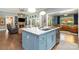 Bright kitchen with a large island, granite countertops, and stainless steel appliances at 219 Reese Wilson Rd, Belmont, NC 28012