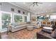 Spacious living room featuring a comfortable sectional sofa and an open view to the kitchen at 219 Reese Wilson Rd, Belmont, NC 28012