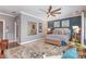 Main bedroom with neutral decor and a large area rug at 219 Reese Wilson Rd, Belmont, NC 28012