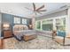 Comfortable main bedroom with large windows and stylish decor at 219 Reese Wilson Rd, Belmont, NC 28012