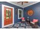 Cozy front porch with decorative rug, seating, and decor, creating a welcoming outdoor space at 219 Reese Wilson Rd, Belmont, NC 28012