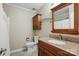 Bathroom features a granite vanity, wood cabinet, and tiled flooring at 2379 Whitley Rd, Fort Mill, SC 29708