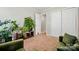 Comfortable bedroom with an assortment of plants and access to closet at 2379 Whitley Rd, Fort Mill, SC 29708