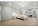 A comfortable primary bedroom with a carpet, white furniture, and a ceiling fan at 2379 Whitley Rd, Fort Mill, SC 29708
