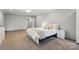 A large primary bedroom featuring neutral walls, carpet flooring, and recessed lighting at 2379 Whitley Rd, Fort Mill, SC 29708