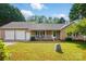 Inviting single-story home with a covered front porch, attached garage, and meticulously kept front yard at 2379 Whitley Rd, Fort Mill, SC 29708