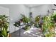Sunroom with lots of space for plants and a black table at 2379 Whitley Rd, Fort Mill, SC 29708