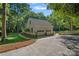 Spacious two-car garage with white siding and a well-maintained driveway and yard at 2500 Little Cove Rd, Charlotte, NC 28270