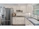 Close up of a bright kitchen featuring stainless steel appliances and granite countertops at 2500 Little Cove Rd, Charlotte, NC 28270