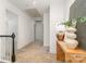 Bright upstairs hallway featuring plush carpeting and stylish decor, leading to the bedrooms and bathrooms at 2600 Oakmeade Dr, Charlotte, NC 28270