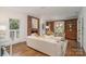 Open living room with fireplace, built-in shelving, and large windows, perfect for modern living at 2600 Oakmeade Dr, Charlotte, NC 28270