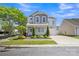 Charming two-story home with a well-manicured lawn and inviting front porch at 3127 Ocalle Ln, Indian Land, SC 29707