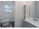 Bathroom featuring a new toilet, vanity with new faucet, and a mirror at 3219 Spring Valley Dr, Gastonia, NC 28052
