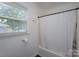 Bathroom with shower and tub combination at 3219 Spring Valley Dr, Gastonia, NC 28052