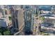 A captivating aerial view of the condo near sports stadiums and neighboring buildings, showcasing city living at 333 W Trade St # 805, Charlotte, NC 28202