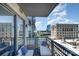 Balcony view with comfortable outdoor seating and cityscape views of nearby buildings at 333 W Trade St # 805, Charlotte, NC 28202