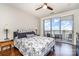 Bedroom featuring a large sliding glass door with a beautiful city view and an ensuite at 333 W Trade St # 805, Charlotte, NC 28202