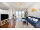 Bright living room with hardwood floors, large windows, and open layout at 333 W Trade St # 805, Charlotte, NC 28202