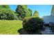 Expansive backyard with well-maintained lawn and patio area, ideal for outdoor activities at 3412 Summerfield Ridge Ln, Matthews, NC 28105