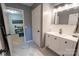 Bathroom featuring a white vanity with gray walls and marble floors at 3412 Summerfield Ridge Ln, Matthews, NC 28105