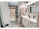 Bathroom featuring a white vanity with gray walls and marble floors at 3412 Summerfield Ridge Ln, Matthews, NC 28105