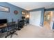 Functional office space with dual desks, ample lighting, and closet space for efficient work at 3412 Summerfield Ridge Ln, Matthews, NC 28105