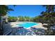 Community pool with inviting lounge area at 3412 Summerfield Ridge Ln, Matthews, NC 28105