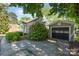Cozy home with a detached garage and a long private driveway at 3612 The Plz, Charlotte, NC 28205