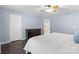 Bedroom has wood floors, a dresser, and ensuite bathroom at 3744 Leela Palace Way, Fort Mill, SC 29708